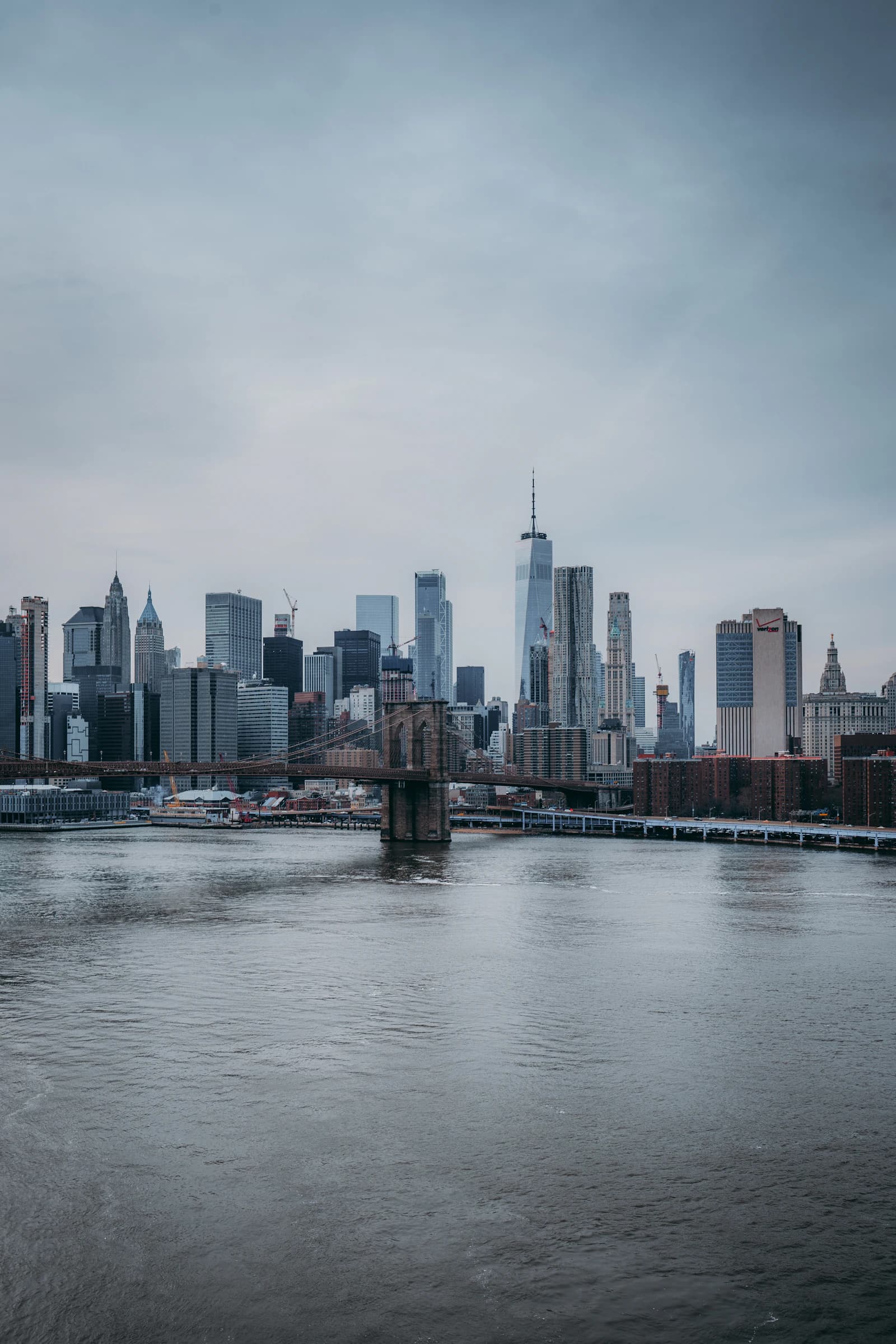 Manhattan skyline across the water at golden hour